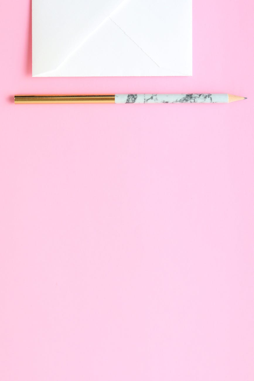 blank paper and a pen, arranged to look like a letter